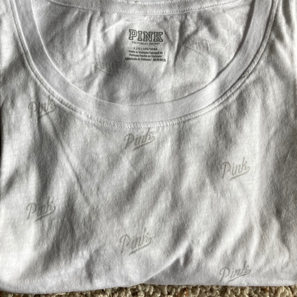 Pink T-Shirt 
White
Size:LG